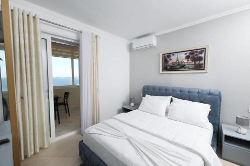 Ліжко або ліжка в номері Summer Hotel