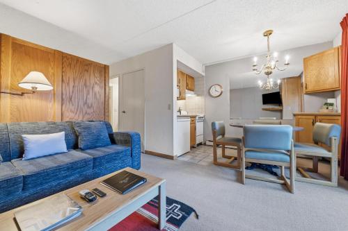a living room with a couch and a dining room at Lift House Lodge, Lionshead Village View, Studio Condo in Vail