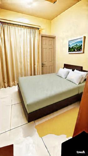 a bedroom with a large bed in a room at 2bhk corporate home in Sohāna