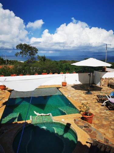 Swimmingpoolen hos eller tæt på Villa Mi Rancho