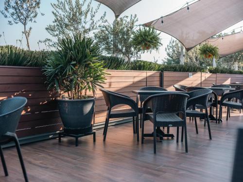 Metria Hotel — Balcony/Terrace