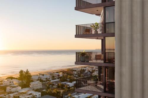 a view of the ocean from a building at Yves Mermaid Beach Apartments by CLLIX in Gold Coast