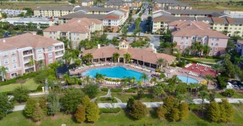 an aerial view of a resort with a swimming pool at 5min Universal Spacious Condo VC101 in Orlando