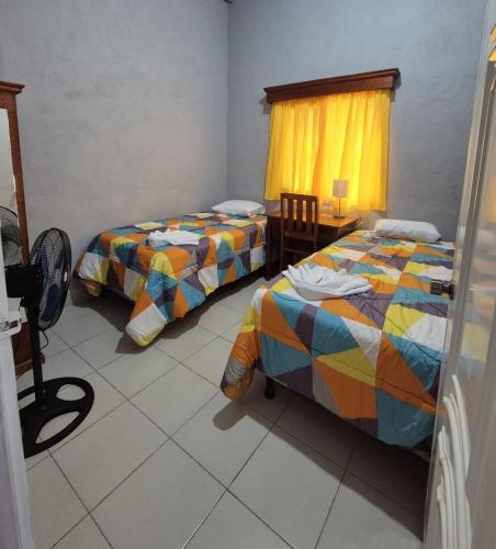 Llit o llits en una habitació de Sol