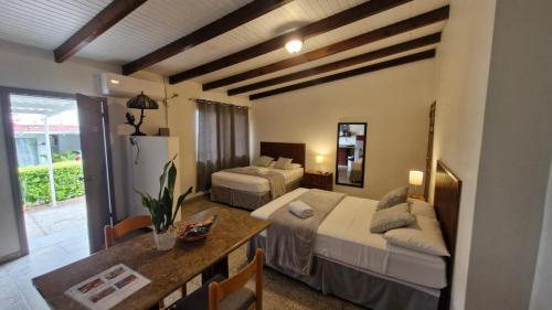 Llit o llits en una habitació de Alojamiento Keops