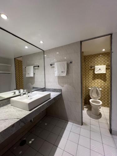 Koupelna v ubytování Hotel Universo
