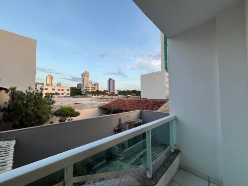 a balcony with a view of the city at Apto 33 - Completo no Centro de Foz in Foz do Iguaçu