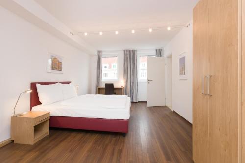 Postel nebo postele na pokoji v ubytování Vienna Stay Apartments or Rooms 1050
