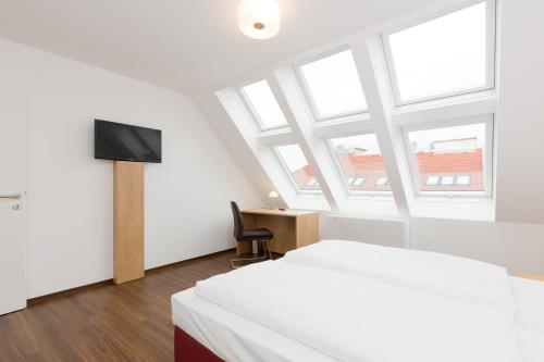 Televisyen dan/atau pusat hiburan di Vienna Stay Apartments or Rooms 1050