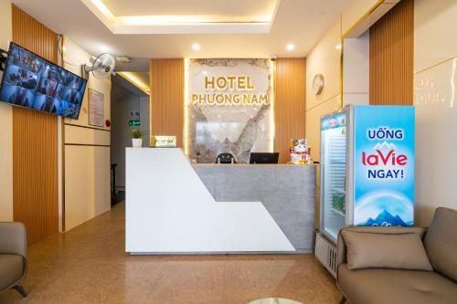 a lobby of a hotel with a reception desk at Phuong Nam Hotel in Ho Chi Minh City
