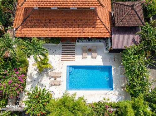 an aerial view of a house with a swimming pool at Ocean Luxury Villas - Seminyak in Seminyak