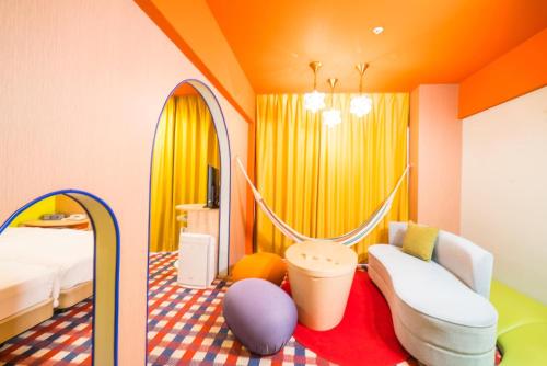 a bedroom with a bed and a mirror at Naeba Prince Hotel in Yuzawa