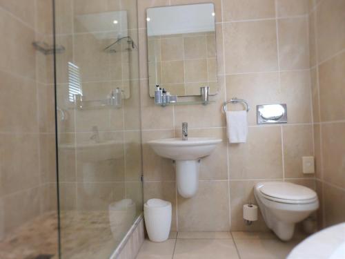 Un baño de The Hampton Exclusive Guesthouse