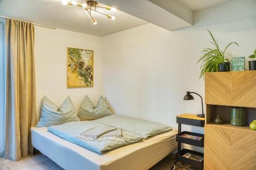 a bedroom with a bed in a room at Ferienwohnung Familiengarten in Volders