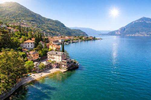 an aerial view of a town on the shore of a lake at Hotel Meridiana in Bellano