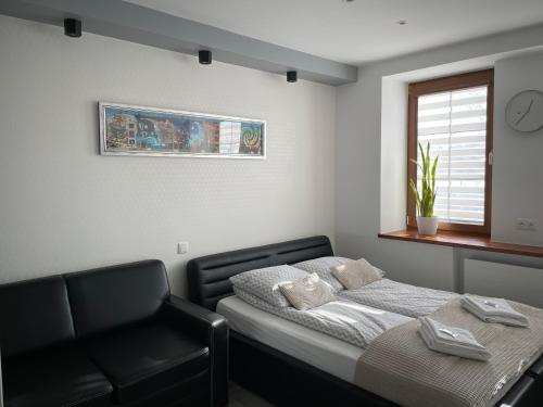 a hospital room with a bed and a window at Apartamenty AP 11 in Częstochowa