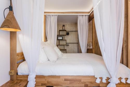 เตียงในห้องที่ Eden Provence