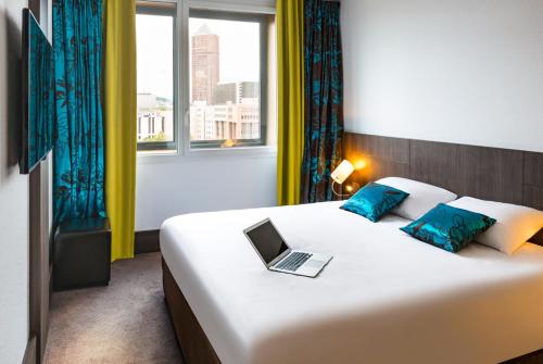 Postel nebo postele na pokoji v ubytování Ibis Styles Lyon Centre - Gare Part Dieu