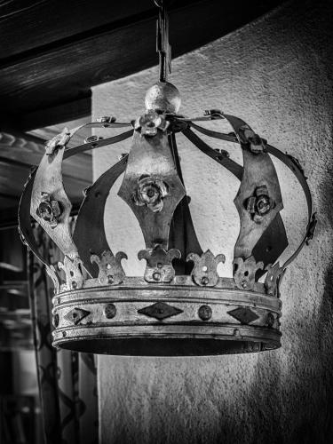 a crown is hanging from a ceiling at Hotel Krone in Steinenbronn