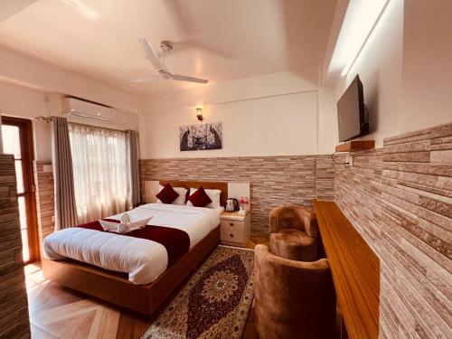 Postelja oz. postelje v sobi nastanitve Hotel Kandara