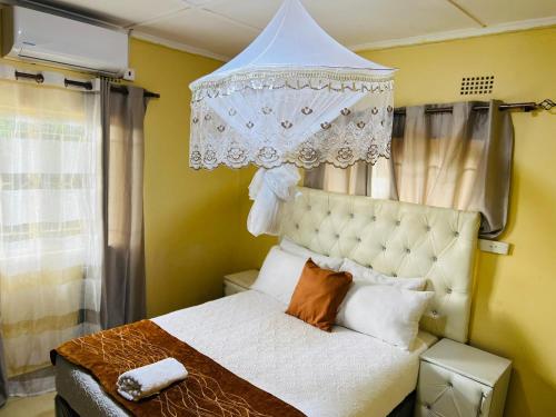 Postel nebo postele na pokoji v ubytování chobe apartments