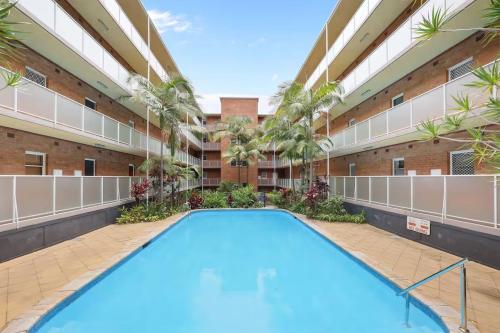 an empty swimming pool in an apartment building at Captain's Pick at Manly Beach in Sydney