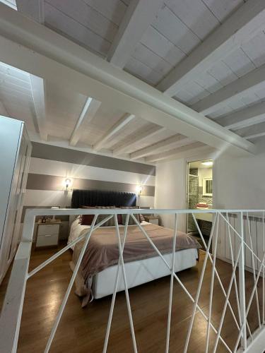 a bedroom with a bed in a room at Conte Durini Apartments & Rooms in Arcore
