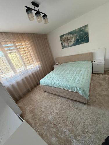 Postel nebo postele na pokoji v ubytování Apartament modern central