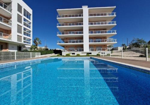 Modern apartment with pool and close to the beach
