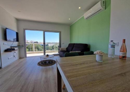 Modern apartment with pool and close to the beach