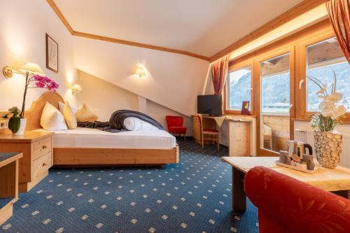 Llit o llits en una habitació de Hotel Erna