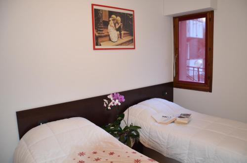 Posteľ alebo postele v izbe v ubytovaní Le Sorgenti