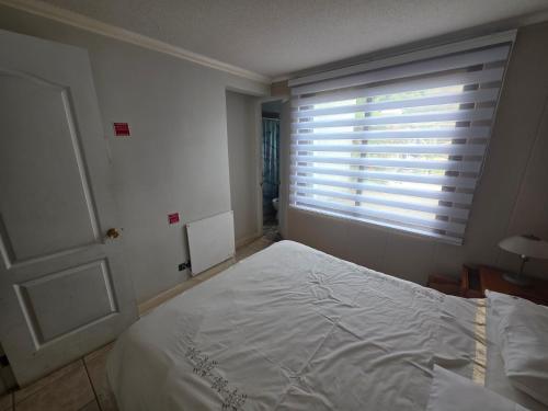 Llit o llits en una habitació de Maitencillo Habitamar