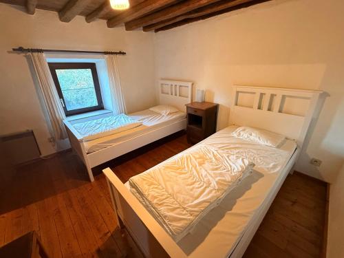 Llit o llits en una habitació de Oneux - Durbuy