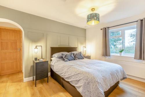 a bedroom with a bed and a window at 1 Bed in Ashcott oc-m33651 in Ashcott
