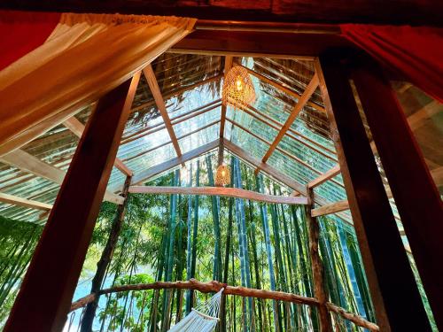 a view from the inside of a bamboo tree house at Napong Ecolodge in Lung Co (1)