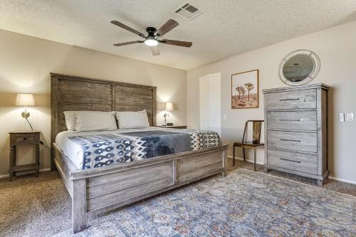 a bedroom with a bed and a ceiling fan at Walk to Riverview Park! Dog-Friendly Mesa Retreat in Mesa