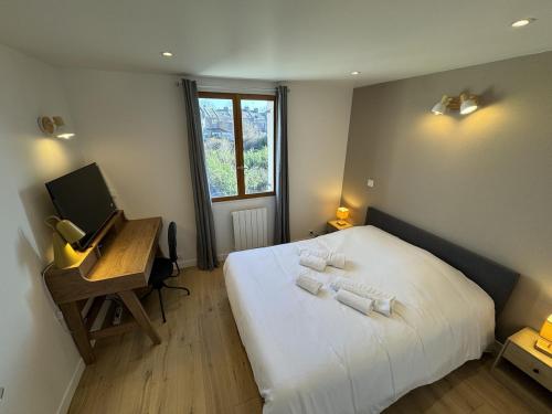 Llit o llits en una habitació de Appartement hyper centre Amiens