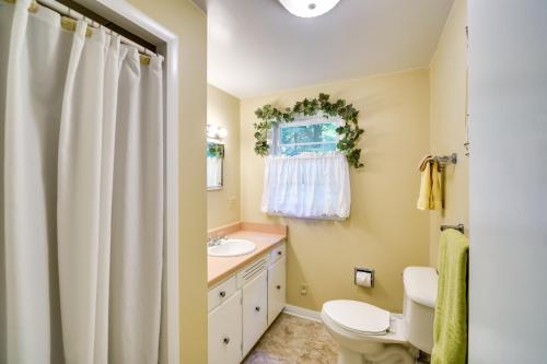 a bathroom with a toilet and a sink at Ephraim Vacation Rental - 3 Mi to Fish Creek Beach in Ephraim