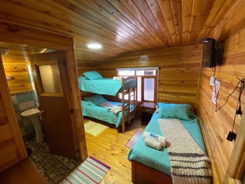 an overhead view of a cabin with two bunk beds at Chiloe Seta in Ancud