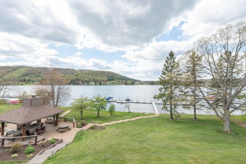a house with a view of a lake at DC Love Shack by Railey Vacations in McHenry