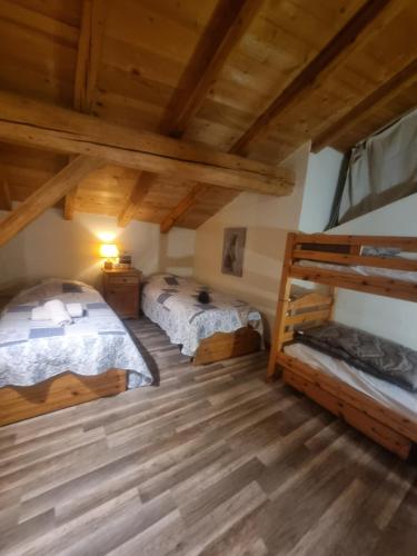 เตียงในห้องที่ Le Chalet d'Augusta