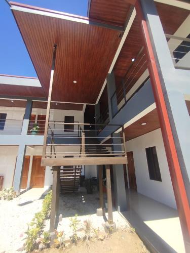 a view of the outside of a house with a deck at Las Morenas in Nosara