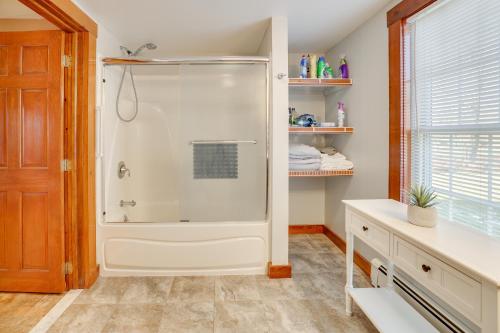 a white shower in a bathroom with a window at Walk to Memorial Park: Pet-Friendly Bethlehem Home in Bethlehem