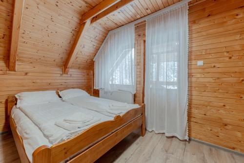 ViiLa Munte Călimani tesisinde bir odada yatak veya yataklar