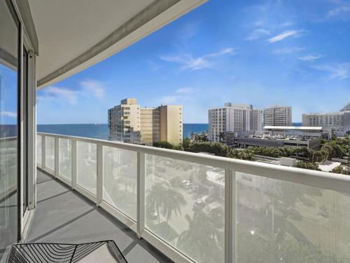 a balcony with a view of the ocean and buildings at WVR Vacation Residences 709 in Fort Lauderdale