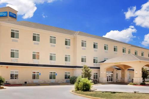 an exterior view of a hospital building at Sonesta Essential Hotels Odessa in Odessa