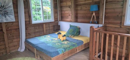 a bedroom with a bed with two teddy bears on it at Duplex escape in Quartier Palmène
