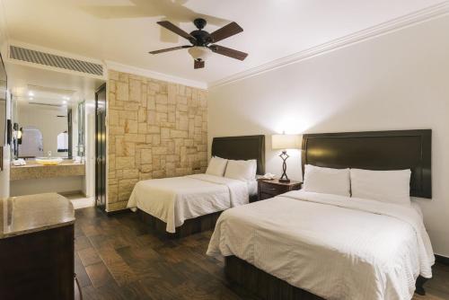 Hotel San Sebastian 객실 침대