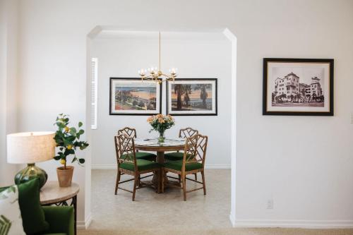 a dining room with a table and chairs at The Sovereign in Los Angeles
